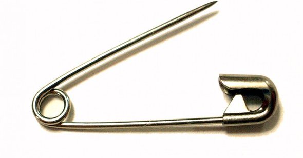 Photo published for Thousands of Britons have pledged to combat racism by wearing a safety pin